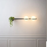 Modern Black Wall Light with Green Plants