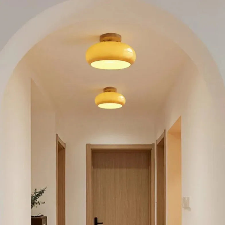 Elliptical Glass Corridor with Recessed Ceiling Lights